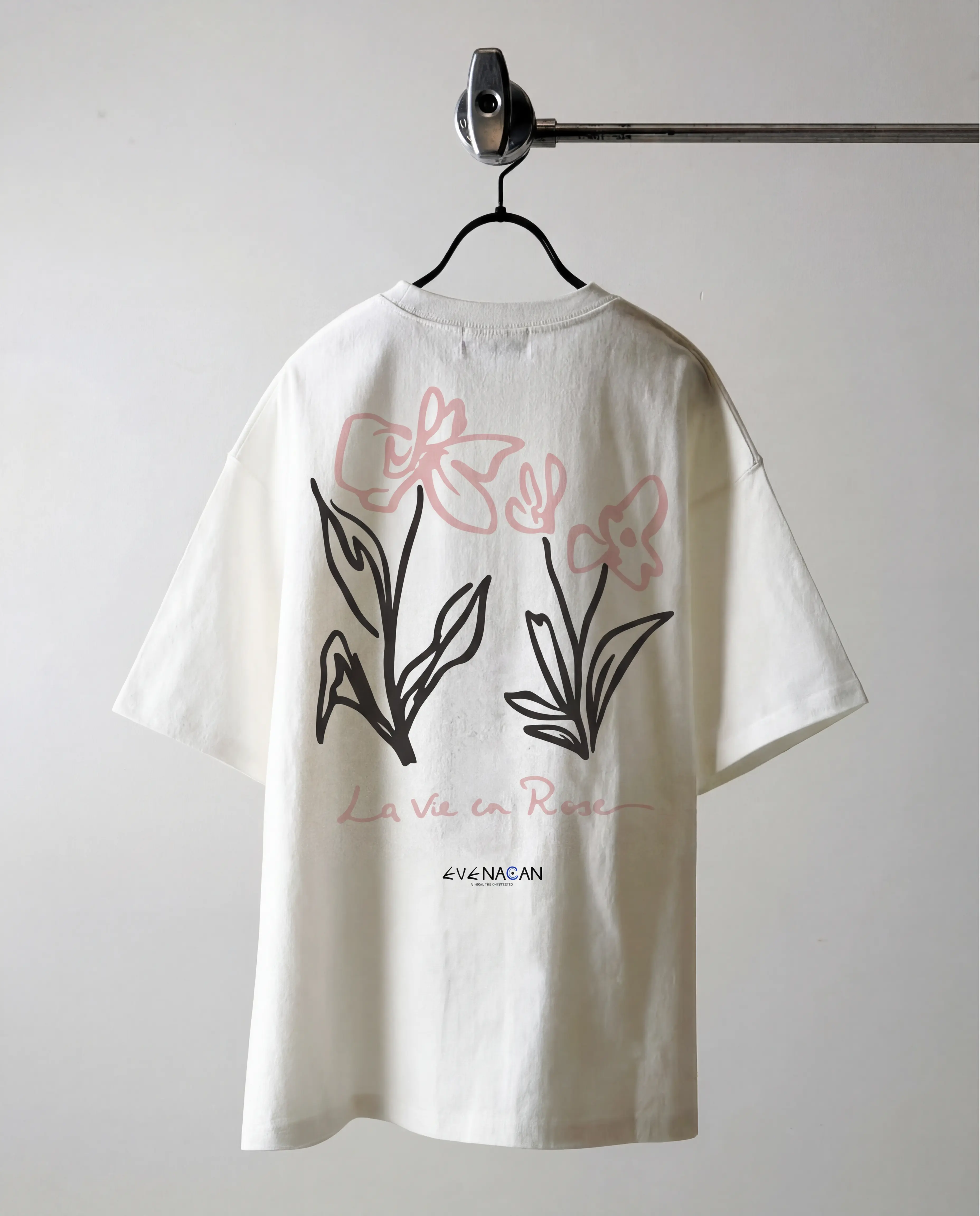 EVENACAN Pink Muse white oversized tee with floral butterfly print