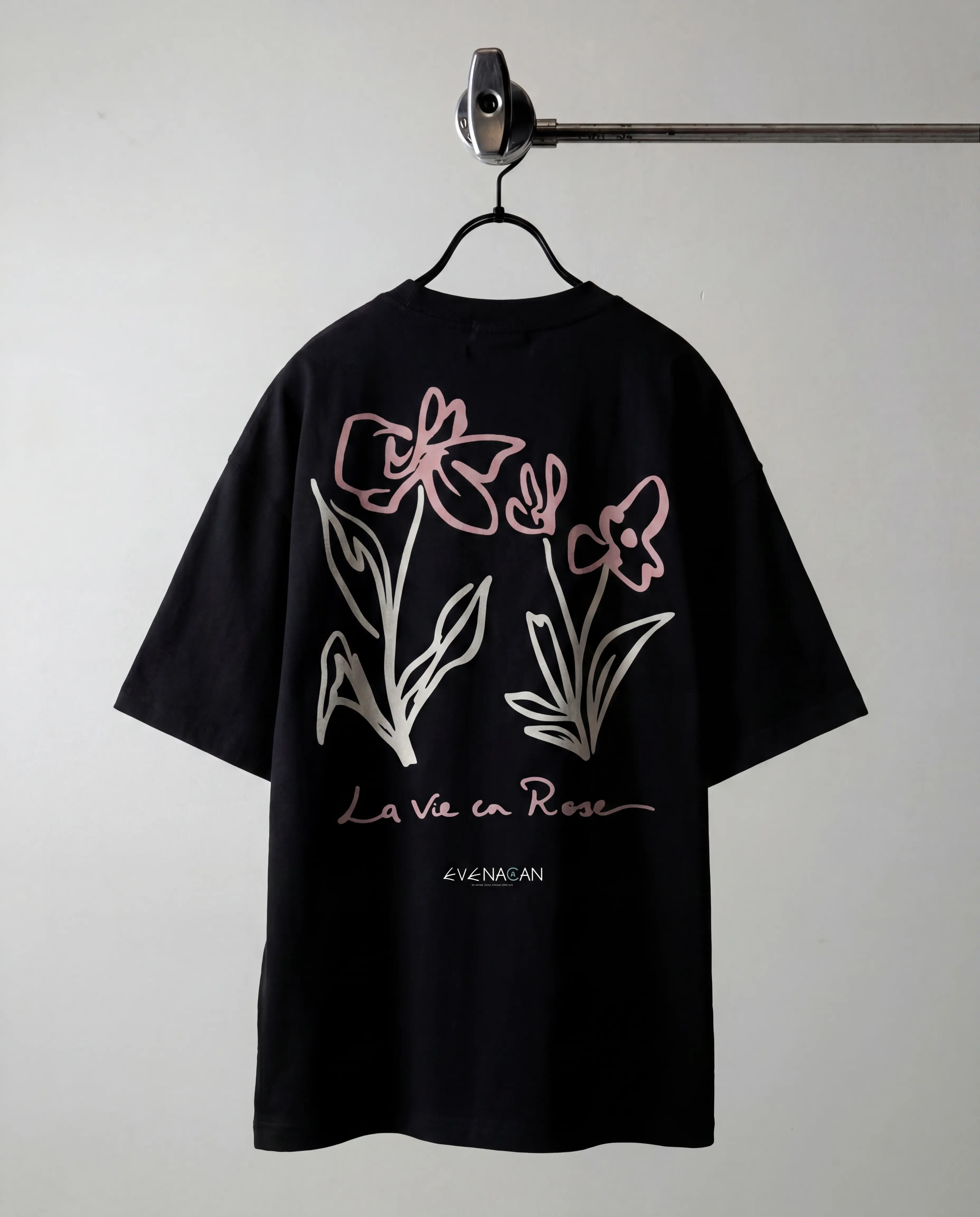 EVENACAN Pink Muse black oversized tee with floral butterfly print