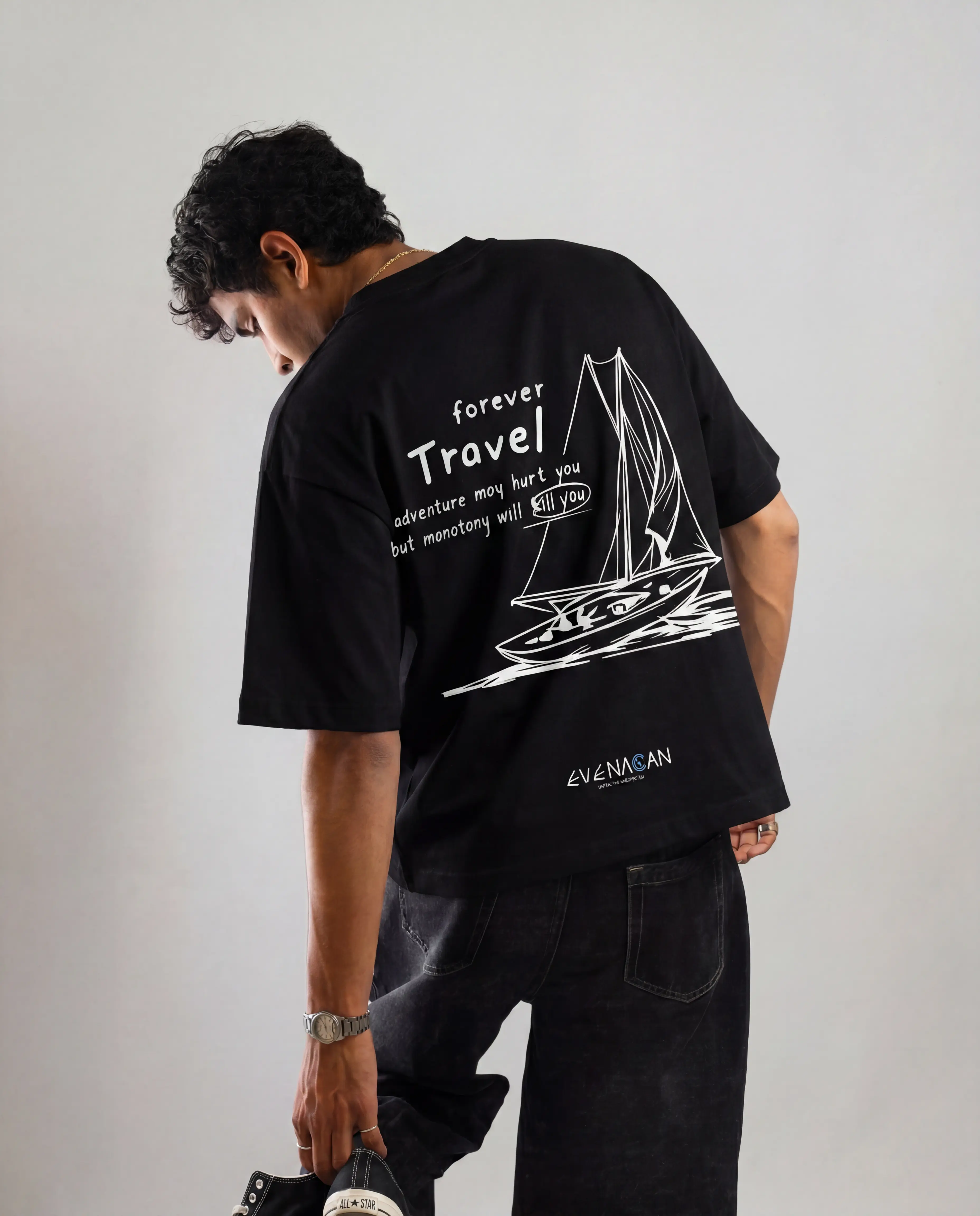 EVENACAN Wanderlust black oversized tee with sailboat graphic